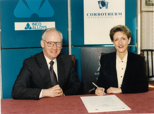 George Nairn from Inco Alloys and Jan Ward of Corrotherm International signing the agreement in 1996.