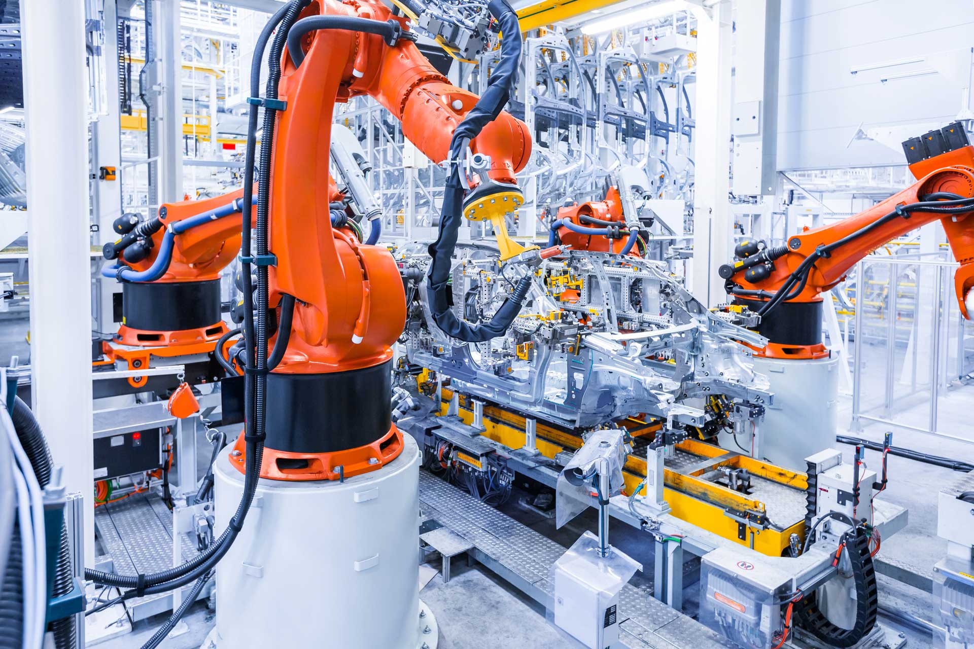 automotive industry robot arms image